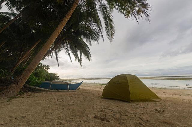 Our tent on the beach in front of JJ Backpackers